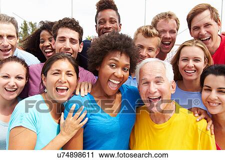 Stock Image - Outdoor Portrait Of Multi-Ethnic Crowd. Fotosearch