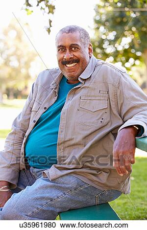 Outdoor Portrait Of Smiling Senior Man View Large Photo Image Stock Image - Outdoor Portrait Of Smiling Senior Man. Fotosearch