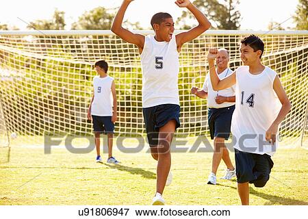 Player Scoring Goal In High School Soccer Match View Large Photo Image Stock Photo - Player Scoring Goal In High School Soccer Match. Fotosearch
