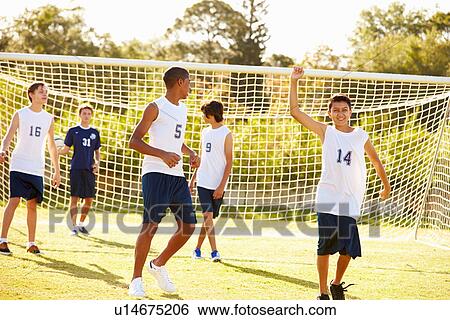 Player Scoring Goal In High School Soccer Match View Large Photo Image Stock Photograph - Player Scoring Goal In High School Soccer Match. Fotosearch