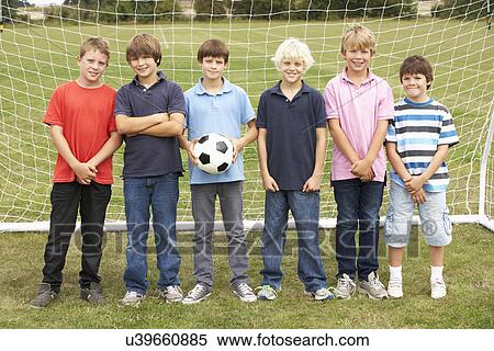 Portrait boys in park with football View Large Photo Image Stock Photography - Portrait boys in park with football. Fotosearch