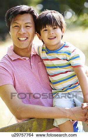 Portrait Of Asian Father And Son In Countryside View Large Photo Image Picture - Portrait Of Asian Father And Son In Countryside. Fotosearch