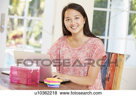 Portrait Of Businesswoman Working In Office At Home View Large Photo Image Stock Photo - Portrait Of Businesswoman Working In Office At Home. Fotosearch
