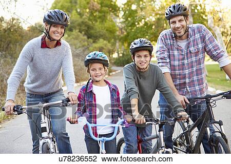 Portrait Of Family On Cycle Ride In Countryside View Large Photo Image Stock Image - Portrait Of Family On Cycle Ride In Countryside. Fotosearch