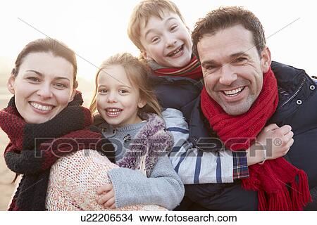 Picture - Portrait Of Family On Winter Beach. Fotosearch