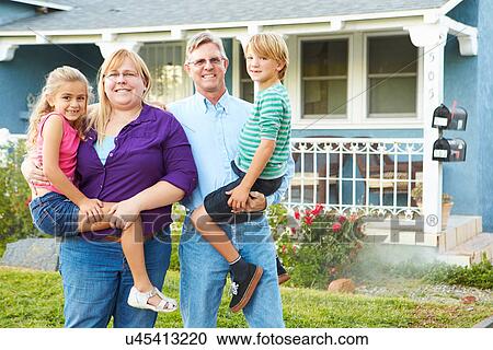 Portrait Of Family Outside Suburban House View Large Photo Image Stock Image - Portrait Of Family Outside Suburban House. Fotosearch