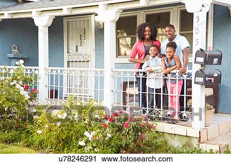 Portrait Of Family Standing On Porch Of Suburban Home View Large Photo Image Stock Image - Portrait Of Family Standing On Porch Of Suburban Home. Fotosearch