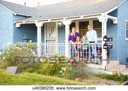Portrait Of Family Standing On Porch Of Suburban Home View Large Photo Image Stock Photography - Portrait Of Family Standing On Porch Of Suburban Home. Fotosearch