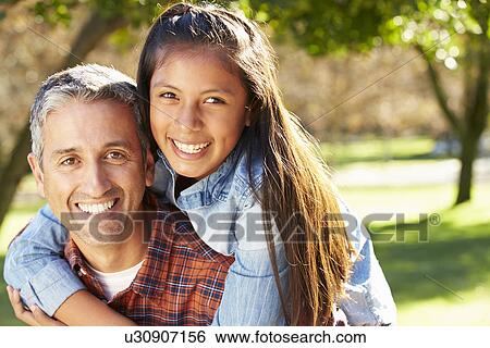 Portrait Of Father And Daughter In Countryside View Large Photo Image Stock Photograph - Portrait Of Father And Daughter In Countryside. Fotosearch