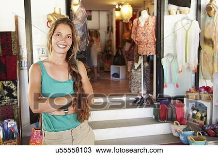 Portrait Of Female Clothing Shop Owner View Large Photo Image Stock Image - Portrait Of Female Clothing Shop Owner . Fotosearch