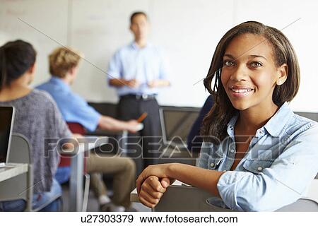 Portrait Of Female High School Student In Classroom View Large Photo Image Stock Photo - Portrait Of Female High School Student In Classroom. Fotosearch