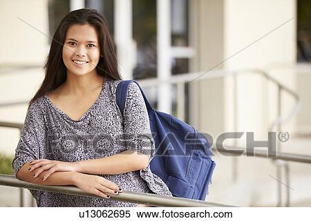 Stock Photography - Portrait Of Female High School Student Outdoors. Fotosearch