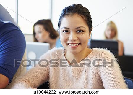 Portrait Of Female University Student In Classroom View Large Photo Image Stock Image - Portrait Of Female University Student In Classroom. Fotosearch