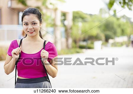 Portrait Of Female University Student Outdoors On Campus View Large Photo Image Stock Image - Portrait Of Female University Student Outdoors On Campus. Fotosearch