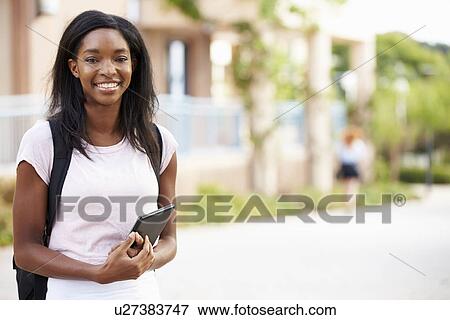 Portrait Of Female University Student Outdoors On Campus View Large Photo Image Stock Photo - Portrait Of Female University Student Outdoors On Campus. Fotosearch
