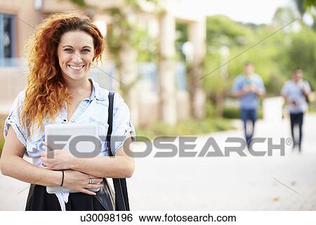 Portrait Of Female University Student Outdoors On Campus View Large Photo Image Stock Photograph - Portrait Of Female University Student Outdoors On Campus. Fotosearch