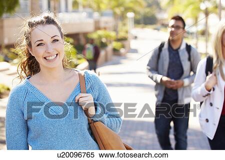 Stock Photography - Portrait Of Female University Student Outdoors On Campus. Fotosearch