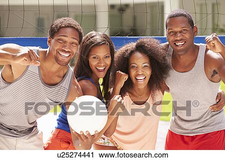 Portrait Of Friends Playing Volleyball Match View Large Photo Image Stock Image - Portrait Of Friends Playing Volleyball Match. Fotosearch