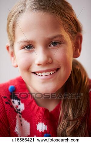 Portrait Of Girl Wearing Christmas Jumper View Large Photo Image Stock Image - Portrait Of Girl Wearing Christmas Jumper. Fotosearch