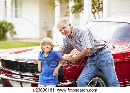 Portrait Of Grandfather And Grandson With Restored Car View Large Photo Image Stock Image - Portrait Of Grandfather And Grandson With Restored Car. Fotosearch