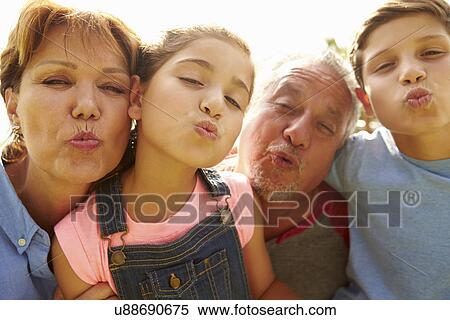 Portrait Of Grandparents And Grandchildren In Garden View Large Photo Image Stock Photography - Portrait Of Grandparents And Grandchildren In Garden . Fotosearch
