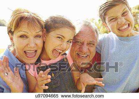 Portrait Of Grandparents And Grandchildren In Garden View Large Photo Image Stock Photography - Portrait Of Grandparents And Grandchildren In Garden . Fotosearch