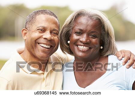 Portrait Of Happy Senior Couple In Garden View Large Photo Image Stock Photography - Portrait Of Happy Senior Couple In Garden. Fotosearch