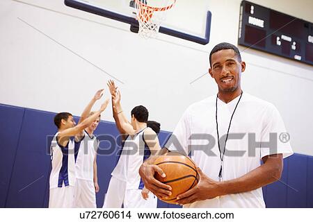 Picture - Portrait Of High School Basketball Coach. Fotosearch