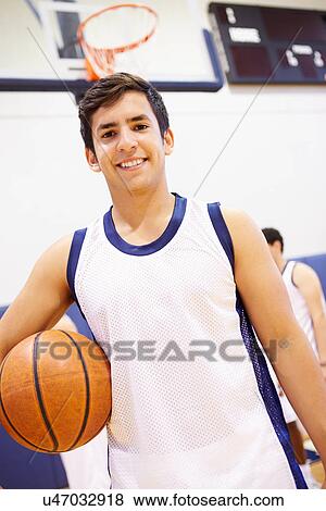 Stock Photo - Portrait Of High School Basketball Player. Fotosearch