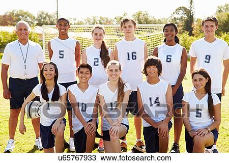 Stock Image - Portrait Of High School Soccer Team With Coach. Fotosearch