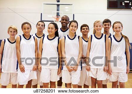 Stock Image - Portrait Of High School Sports Team In Gym . Fotosearch