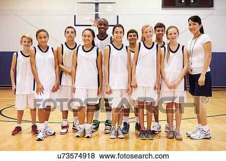 Stock Photo - Portrait Of High School Sports Team In Gym With Coach. Fotosearch