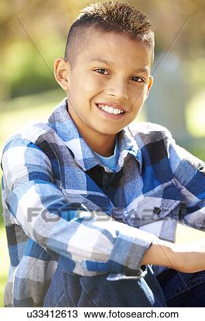 Portrait Of Hispanic Boy In Countryside View Large Photo Image Stock Image - Portrait Of Hispanic Boy In Countryside. Fotosearch