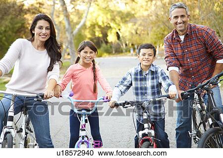 Portrait Of Hispanic Family On Cycle Ride In Countryside View Large Photo Image Stock Image - Portrait Of Hispanic Family On Cycle Ride In Countryside. Fotosearch