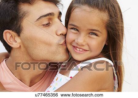 Stock Photograph - Portrait Of Hispanic Father And Daughter. Fotosearch