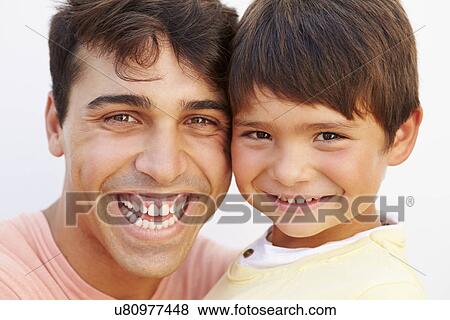 Stock Photo - Portrait Of Hispanic Father And Son. Fotosearch