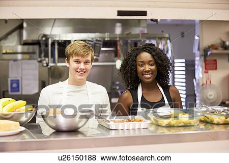 Stock Photo - Portrait Of Kitchen Staff In Homeless Shelter. Fotosearch