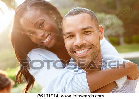 Picture - Portrait Of Loving African American Couple In Countryside. Fotosearch