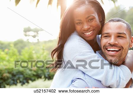 Portrait Of Loving African American Couple In Countryside View Large Photo Image Stock Image - Portrait Of Loving African American Couple In Countryside. Fotosearch