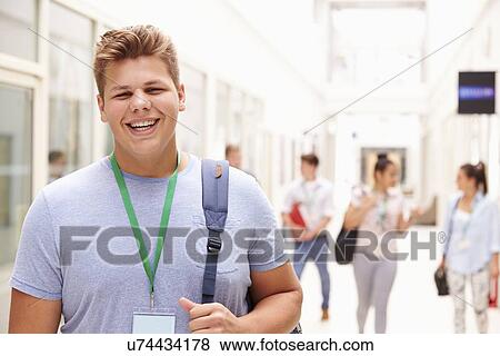 Portrait Of Male College Student In Hallway View Large Photo Image Stock Photo - Portrait Of Male College Student In Hallway. Fotosearch