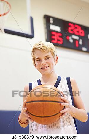 Portrait Of Male High School Basketball Player View Large Photo Image Stock Photo - Portrait Of Male High School Basketball Player. Fotosearch
