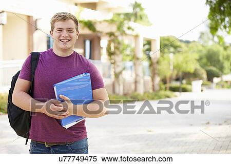 Portrait Of Male University Student Outdoors On Campus View Large Photo Image Stock Photography - Portrait Of Male University Student Outdoors On Campus. Fotosearch