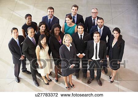 Portrait Of Multi-Cultural Office Staff Standing In Lobby View Large Photo Image Stock Image - Portrait Of Multi-Cultural Office Staff Standing In Lobby. Fotosearch