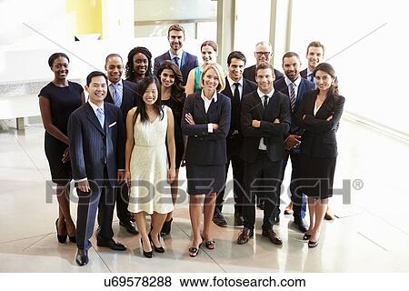 Portrait Of Multi-Cultural Office Staff Standing In Lobby View Large Photo Image Stock Photo - Portrait Of Multi-Cultural Office Staff Standing In Lobby. Fotosearch