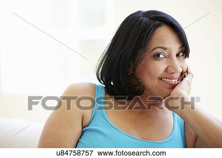 Portrait Of Overweight Woman Sitting On Sofa View Large Photo Image Stock Photo - Portrait Of Overweight Woman Sitting On Sofa. Fotosearch