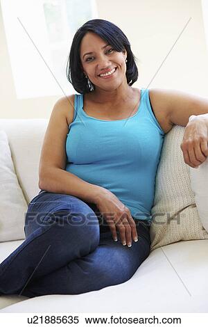 Portrait Of Overweight Woman Sitting On Sofa View Large Photo Image Stock Photography - Portrait Of Overweight Woman Sitting On Sofa. Fotosearch
