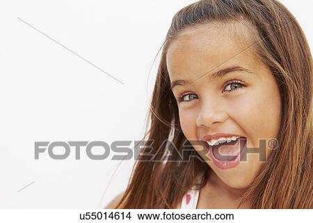 Portrait Of Pretty Hispanic Girl Standing By Wall View Large Photo Image Picture - Portrait Of Pretty Hispanic Girl Standing By Wall. Fotosearch