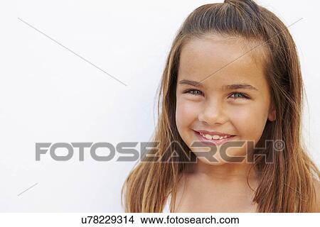 Portrait Of Pretty Hispanic Girl Standing By Wall View Large Photo Image Picture - Portrait Of Pretty Hispanic Girl Standing By Wall. Fotosearch