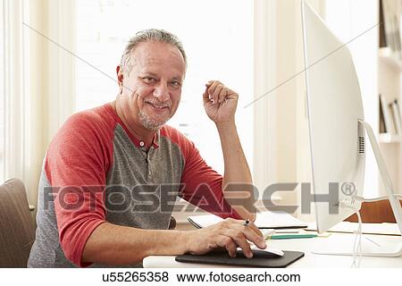 Portrait Of Senior Man Using Computer At Home View Large Photo Image Stock Photo - Portrait Of Senior Man Using Computer At Home. Fotosearch