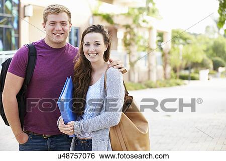 Portrait Of Student Couple Outdoors On University Campus View Large Photo Image Stock Photograph - Portrait Of Student Couple Outdoors On University Campus. Fotosearch